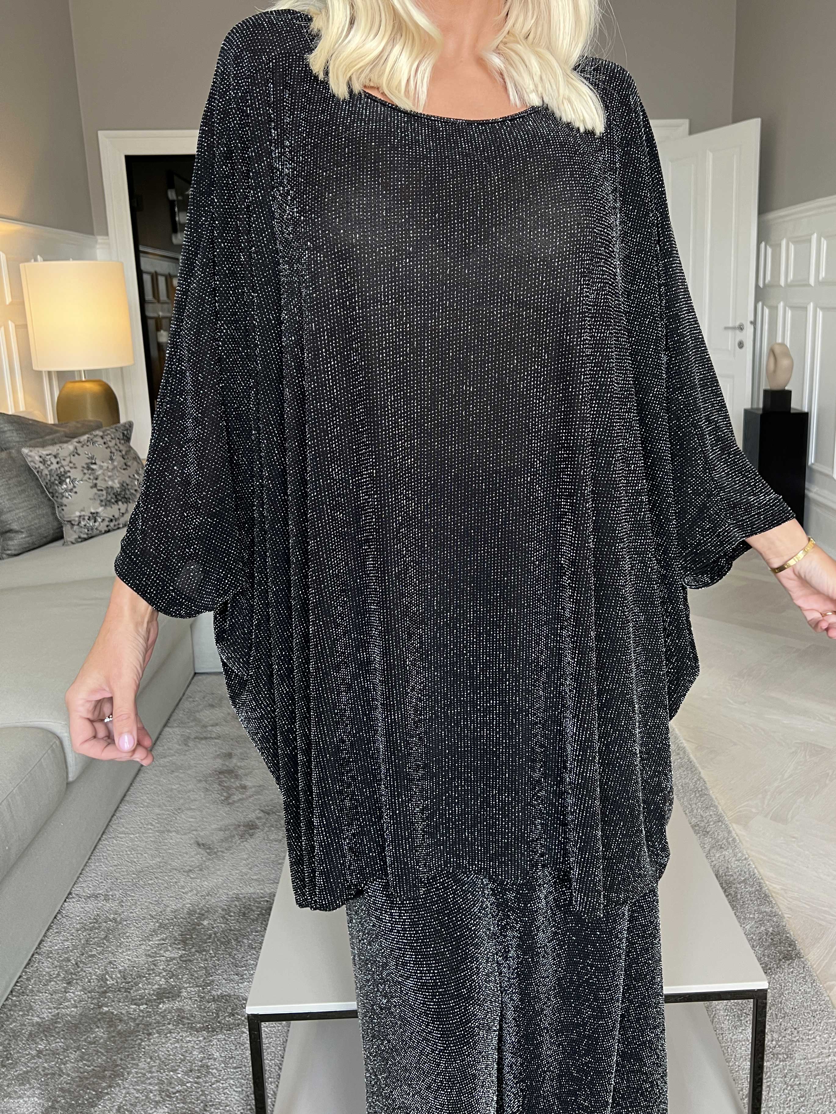 Estella Glitter - Oversized tunika med fladdermusärmar